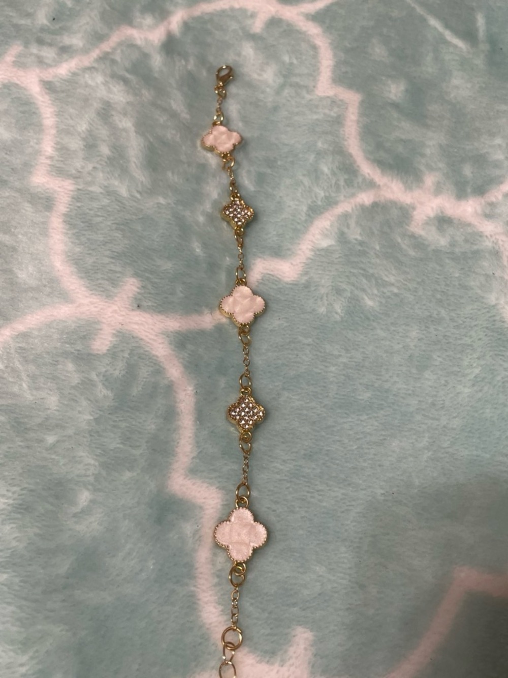 Gold tone Chain Bracelet with Pink Clover Accents